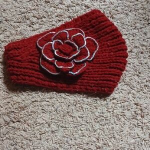 Elegant Red Knit Headband with Floral Accent